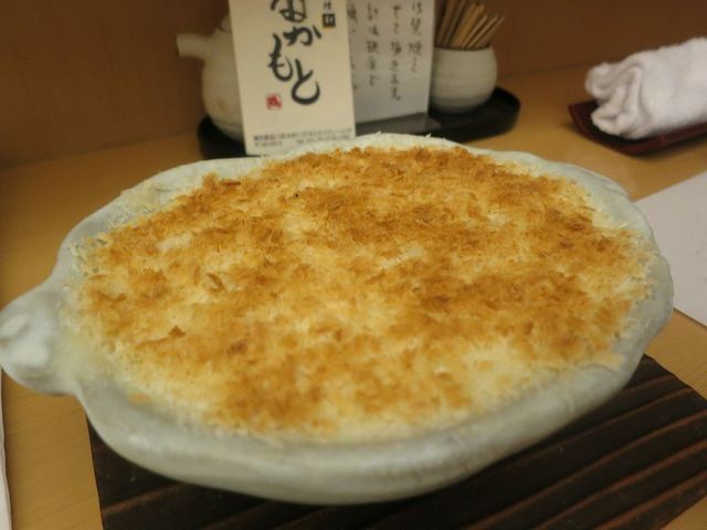 お粥が組み込まれた丁寧な調理の中華